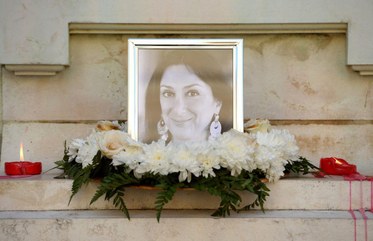 A picture of Daphne Caruana Galizia is shown at the foot of the Great Siege monument in Valletta, Malta, on Oct. 19, 2017. (Matthew Mirabelli/AFP/Getty Images)