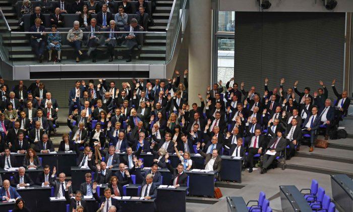 German Parties Brace for Tough Coalition Talks on Migration