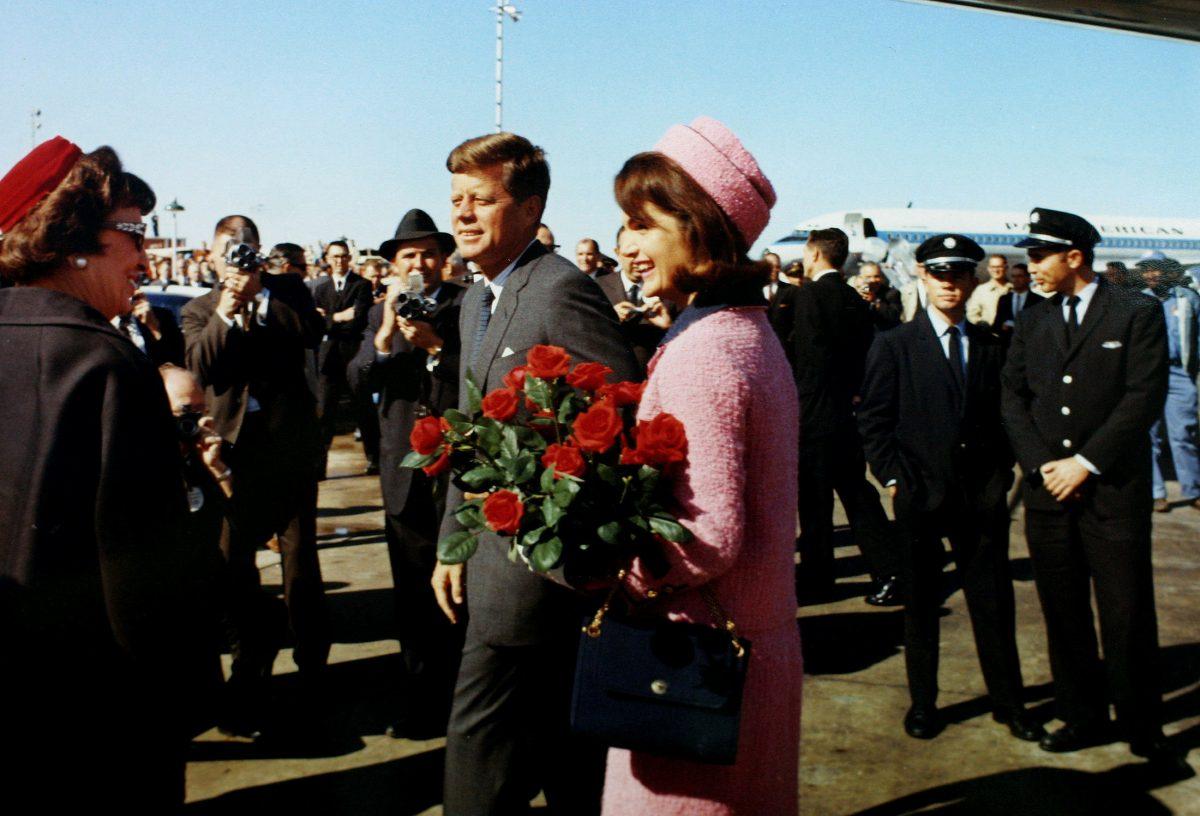 U.S. President John F. Kennedy and first lady Jacqueline Bouvier Kennedy arrive at Love Field in Dallas, Texas less than an hour before his assassination in this Nov. 22, 1963. (JFK Library/The White House/Cecil Stoughton/File Photo via REUTERS)