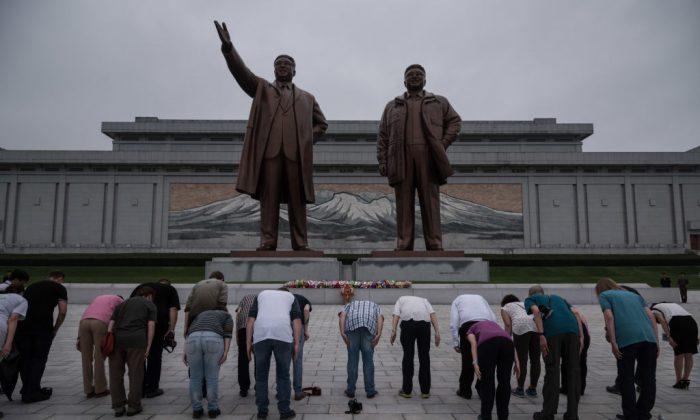 North Korea Forced to Protect Statues of Kim Family Against Vandalism