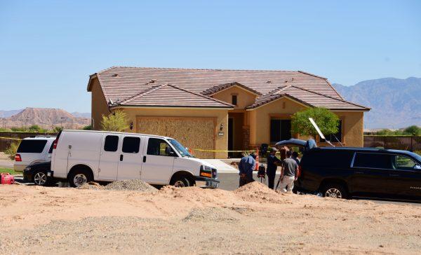 Members of the media gather in front of the home of mass murderer Stephen Paddock, seen in Mesquite, Nevada, Oct. 3, 2017. (ROBYN BECK/AFP/Getty Images)