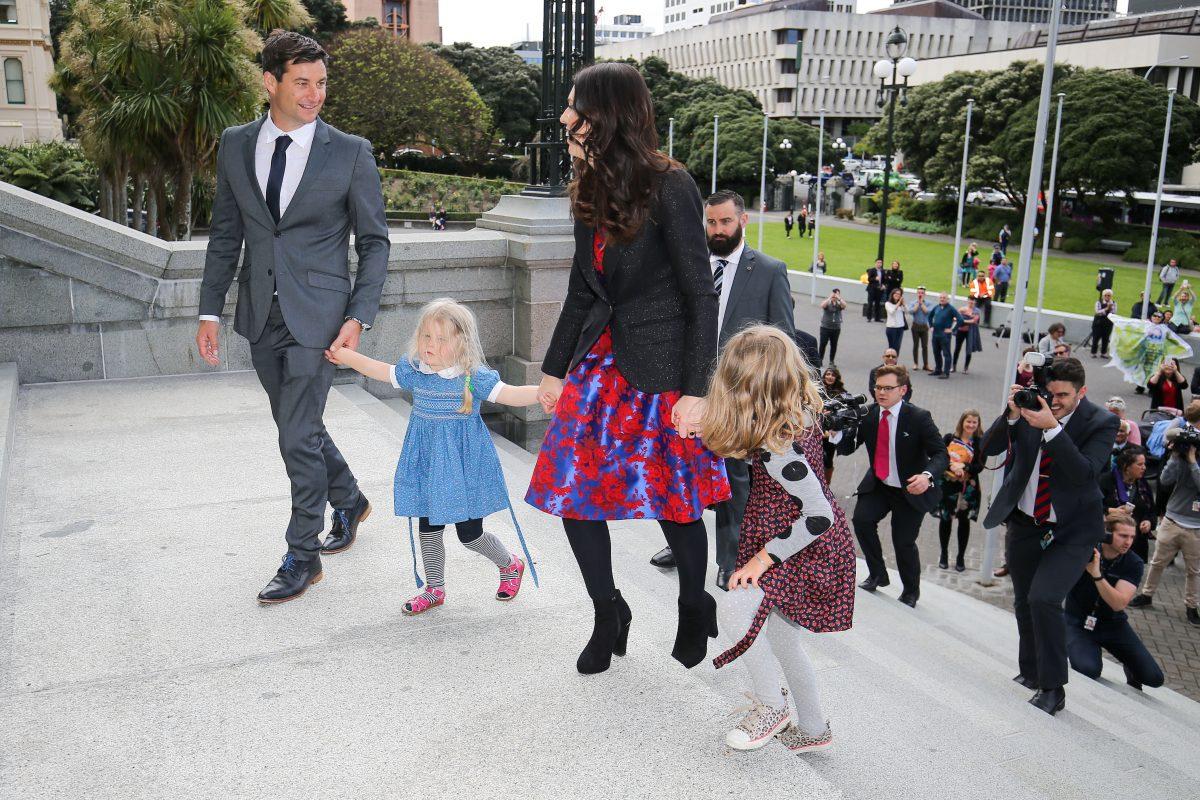 Prime Minister Jacinda Ardern, her nieces and partner Clarke Gayford arrive at Parliament after a swearing-in ceremony at Government House on Oct. 26, 2017 in Wellington, New Zealand. (Hagen Hopkins/Getty Images)