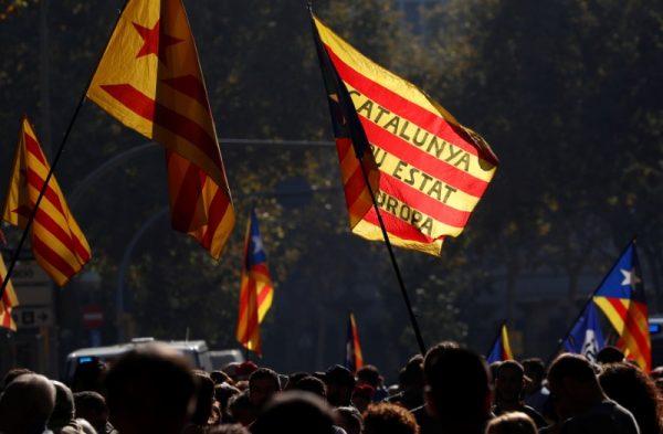 Catalan separatist flags are seen as demonstrators gather outside the Catalan regional parliament in Barcelona, Spain, Oct. 27, 2017. (Reuters/Yves Herman)