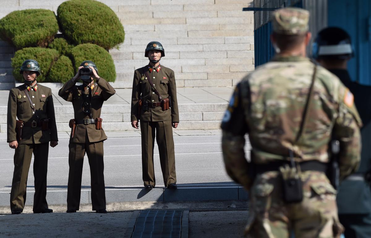 North Korean soldiers look at the South side while US Secretary of Defense Jim Mattis and South Korean Defense Minister Song Young-Moo visit on Oct. 27, 2017. (JUNG YEON-JE/AFP/Getty Images)