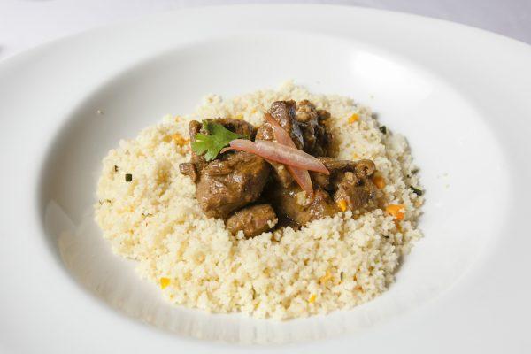 Lamb with yellow curry, couscous, vegetables, and cardamom, at Hotel Riu Palace Jamaica resort. (Annie Wu/The Epoch Times)