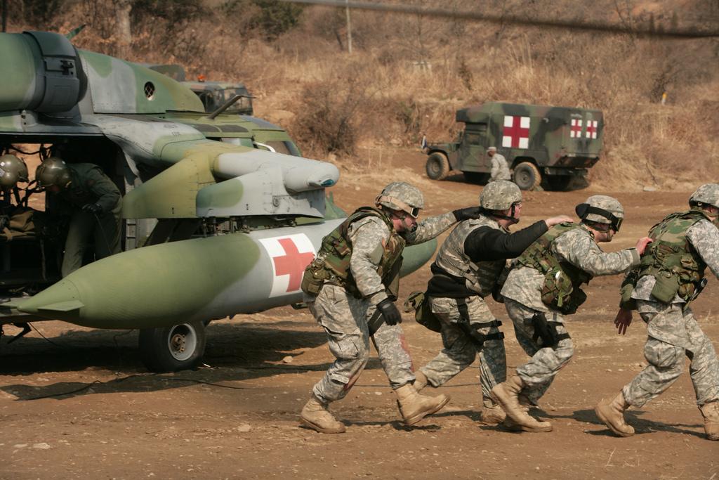 U.S. Army Soldiers and Republic of Korea (ROK) army soldiers hold a joint casualty evacuation exercise during exercise Key Resolve/Foal Eagle in Uijongbu, South Korea, on March 5, 2008. (Lance Cpl. Ashley S. Stadel/U.S. Marine Corps)