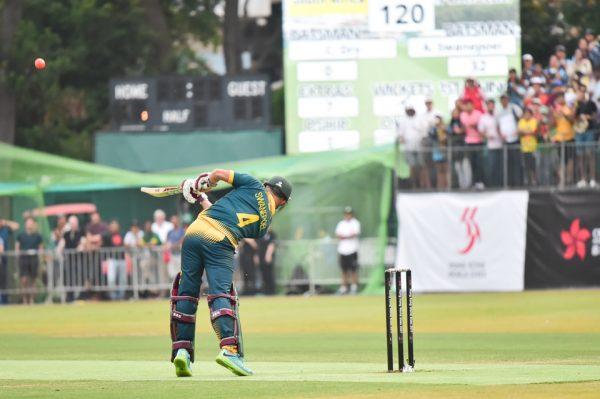 South Africa’s team Captain Aubrey Swanepeol hits a boundary to win the Hong Kong World Cricket Sixes Cup with the last ball of play at KCC on Sunday Oct 29, 2017 (Bill Cox/Epoch Times).