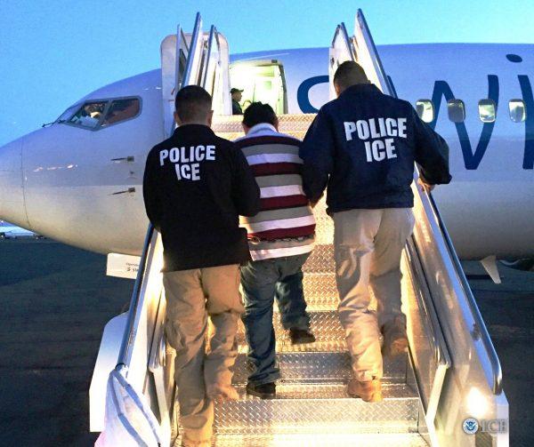 Jesus Guitron-Aguilera, a convicted sex offender, who has been wanted by ICE since 2010, is removed aboard a charter flight coordinated by ICE Air Operations, on Oct. 11, 2017. (ICE)