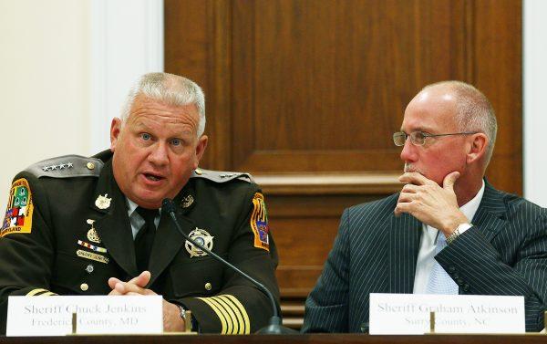 Sheriff Chuck Jenkins, of Frederick County, Md. (L), and Sheriff Graham Atkinson, of Surry County, N.C., at a discussion on illegal immigration in Washington on Oct. 12, 2011. (Mark Wilson/Getty Images)