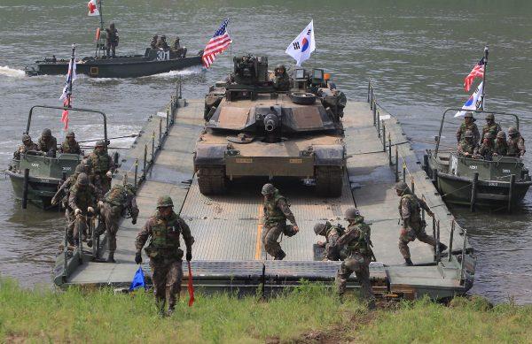 U.S. Army M1A2 tank during maneuvers with U.S and South Korean soldiers participate in a river crossing exercise on May 30, 2013 in Yeoncheon-gun, South Korea. The joint exercise is one of several the two countries have held in recent months. (Chung Sung-Jun/Getty Images)