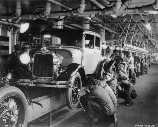 1927: The production line at a Ford motor factory in Michigan. (Hulton Archive/Getty Images)