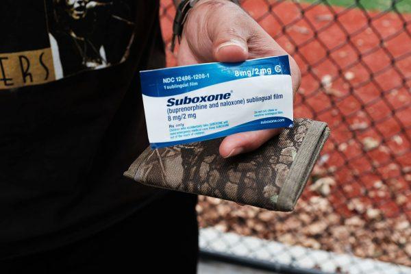 A heroin user holds Suboxone, a medication-assisted treatment for opioid addicts, in New York City on Aug. 8, 2017. (Spencer Platt/Getty Images)