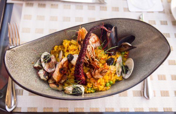 La V Paella, with scallops, tiger prawns, chorizo, clams, mussels, octopus, and squid ink aioli at The Med at La Valencia Hotel in La Jolla, Calif. on Aug. 1, 2017. (Channaly Philipp/The Epoch Times)