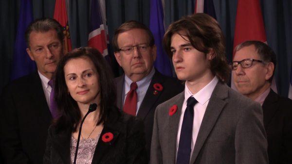 Sergei Magnitsky’s widow Natalia and their son Nikita speak at a press conference in Ottawa on Nov. 1, 2017 while former MP and minister of Justice Irwin Cotler (R), Senator Percy Downe (C), and MP John McKay listen in the background. Cotler was a strong advocate for the Magnitsky Law that Canada adopted in 2017. (Limin Zhou/NTD Television)