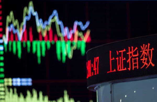A board shows the stock movements inside the Shanghai Stock Exchange on September 22, 2015. (Johannes Eisele/AFP/Getty Images)