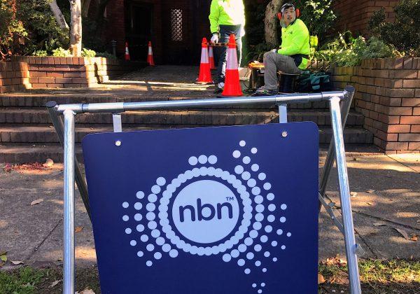 Workers install cables for the Australian National Broadband Network at an apartment block in Sydney, Australia, May 30, 2017. (REUTERS/David Gray/File Photo)