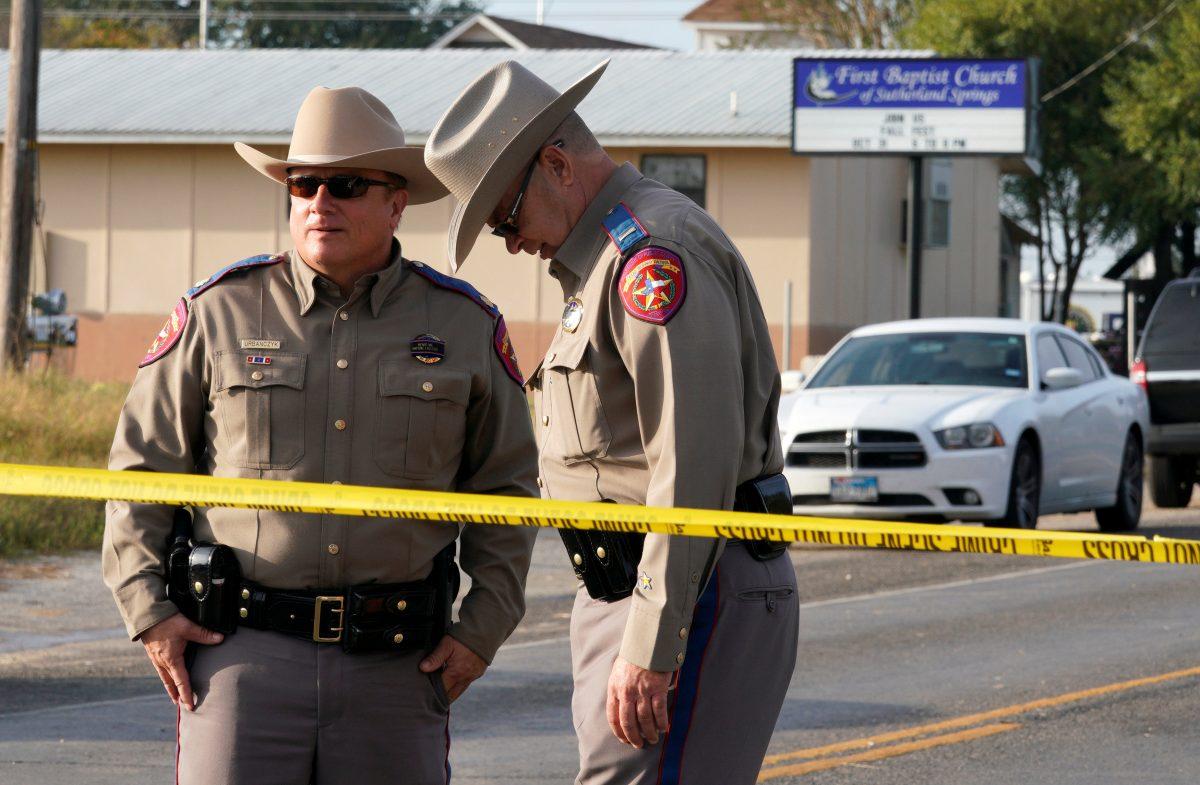 Police stand outside the site of a shooting at the First Baptist Church of Sutherland Springs, Texas, U.S. Nov. 6, 2017. (Reuters/Rick Wilking)