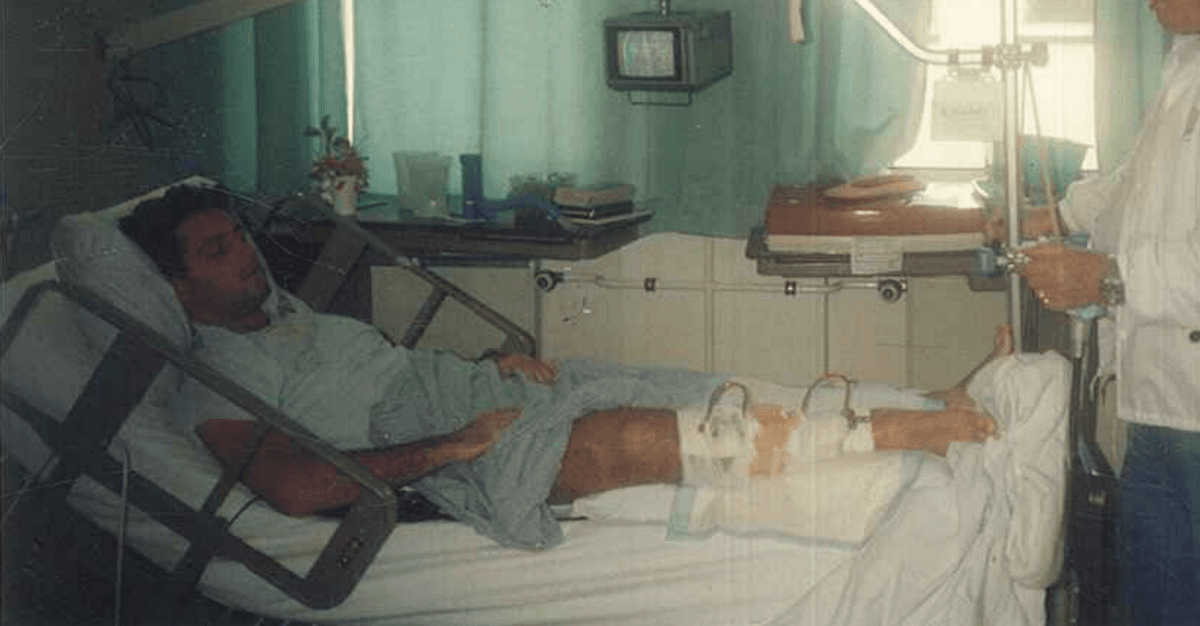 Navy SEAL Howard Wasdin lies in a hospital where his leg was treated following the Battle of Mogadishu in 1993. (Courtesy of Howard Wasdin)