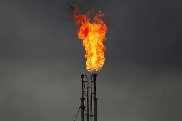Natural gas is flared off at a plant outside the town of Cuero, Texas. (Spencer Platt/Getty Images)