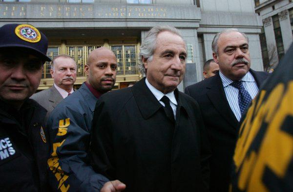 Bernard Madoff (C) walks out from Federal Court after a bail hearing in Manhattan in New York City on Jan. 5, 2009. (Hiroko Masuike/Getty Images)