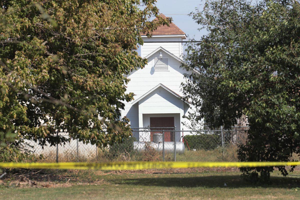Crime scene tape remains stretched along a road near the First Baptist Church of Sutherland Springs,  Texas on Nov. 7, 2017 . (Scott Olson/Getty Images)