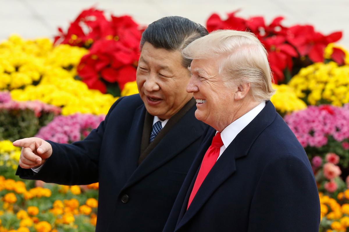 Trump and Xi attend a welcoming ceremony in Beijing on November 9, 2017. (Thomas Peter-Pool/Getty Images)