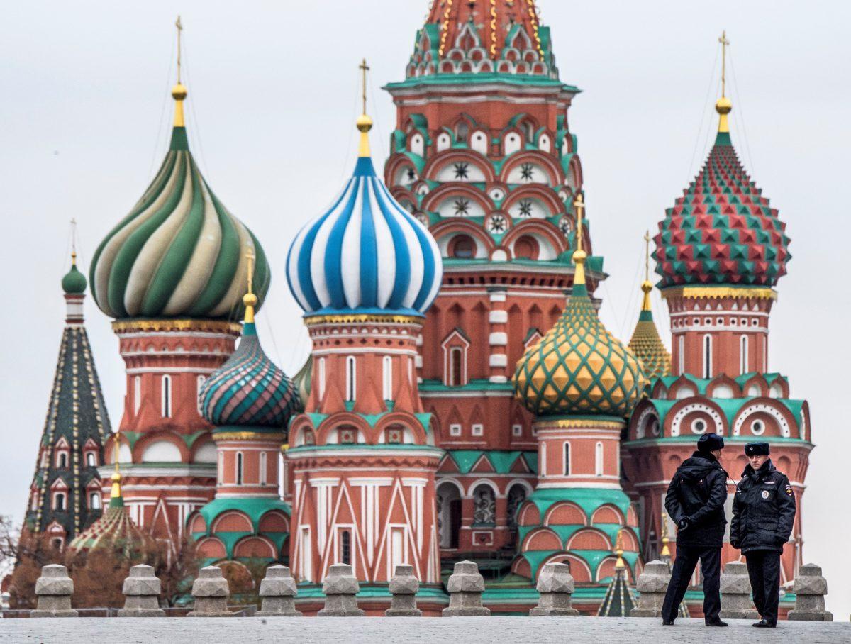 Two policemen stand guard on the Red Square in front of St. Basil Cathedral on National Unity Day in Moscow on Nov. 4, 2017. (MLADEN ANTONOV/AFP/Getty Images)
