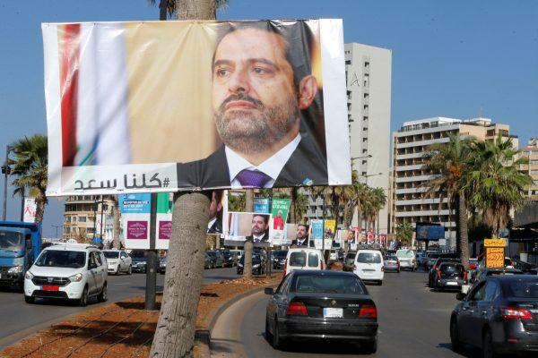 Posters depicting Lebanon's Prime Minister Saad al-Hariri, who has resigned from his post, are seen in Beirut, Lebanon, November 10, 2017. (Reuters/Mohamed Azakir)