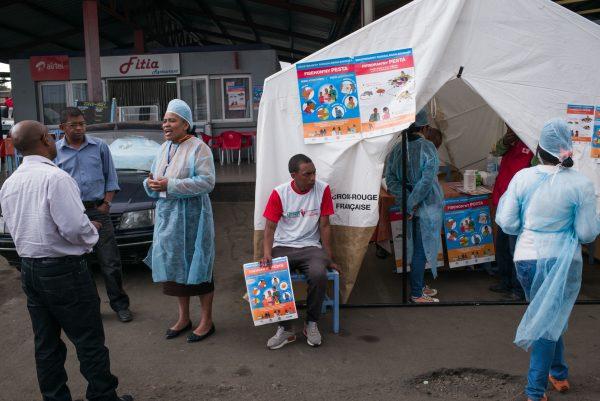 Doctors and nurses from The Ministry of Health and officers of the Malagasy Red Cross staff a healthcare checkpoint in the Ampasapito district in Antananarivo, Madagascar, on Oct. 5, 2017. (RIJASOLO/AFP/Getty Images)