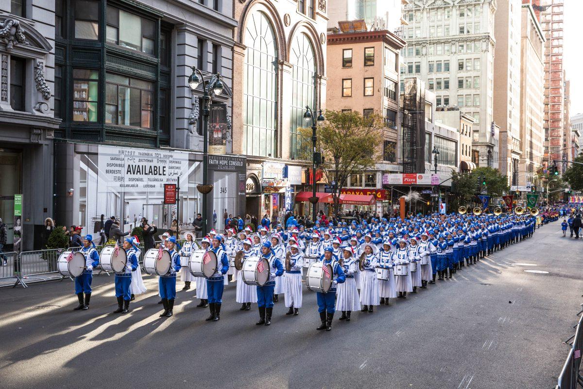 The Tian Guo (Divine Land) Marching Band from the Falun Dafa spiritual practice, participate in the Veterans Day Memorial parade in New York on Nov. 11, 2017. (Benjamin Chasteen/The Epoch Times)