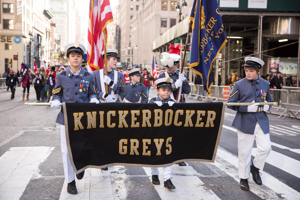 Soldiers, veterans and civilians march in the Veterans Day Parade in New York on Nov. 11, 2017. The parade is the the largest Veterans Day event in the nation, as this year's parade featured thousands of marchers from military units, civic and youth groups, businesses and high school bands from across the country and veterans of all eras. (Benjamin Chasteen/The Epoch Times)