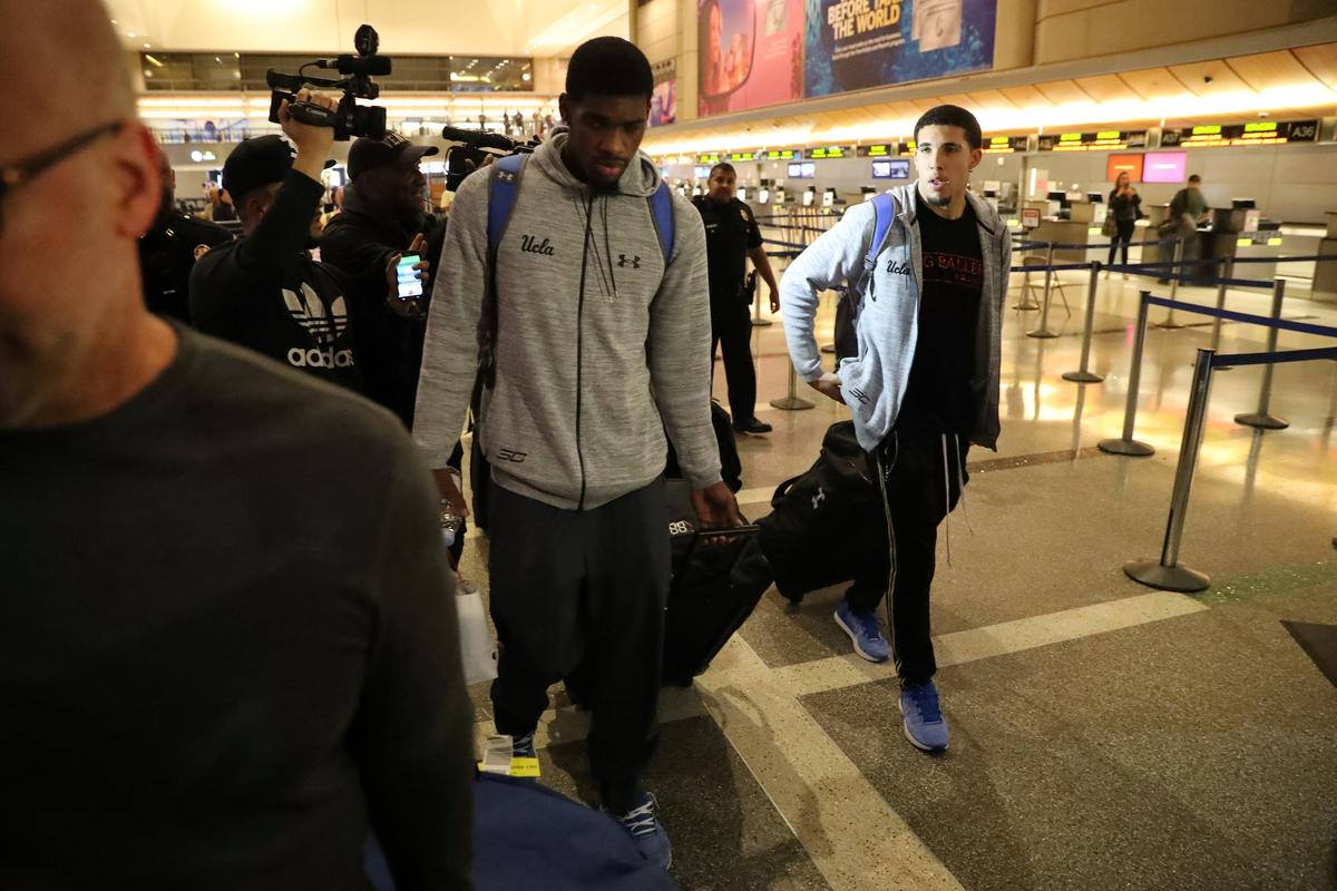 UCLA basketball players LiAngelo Ball (R) and Cody Riley arrive at LAX on November 14, 2017. (REUTERS/Lucy Nicholson)