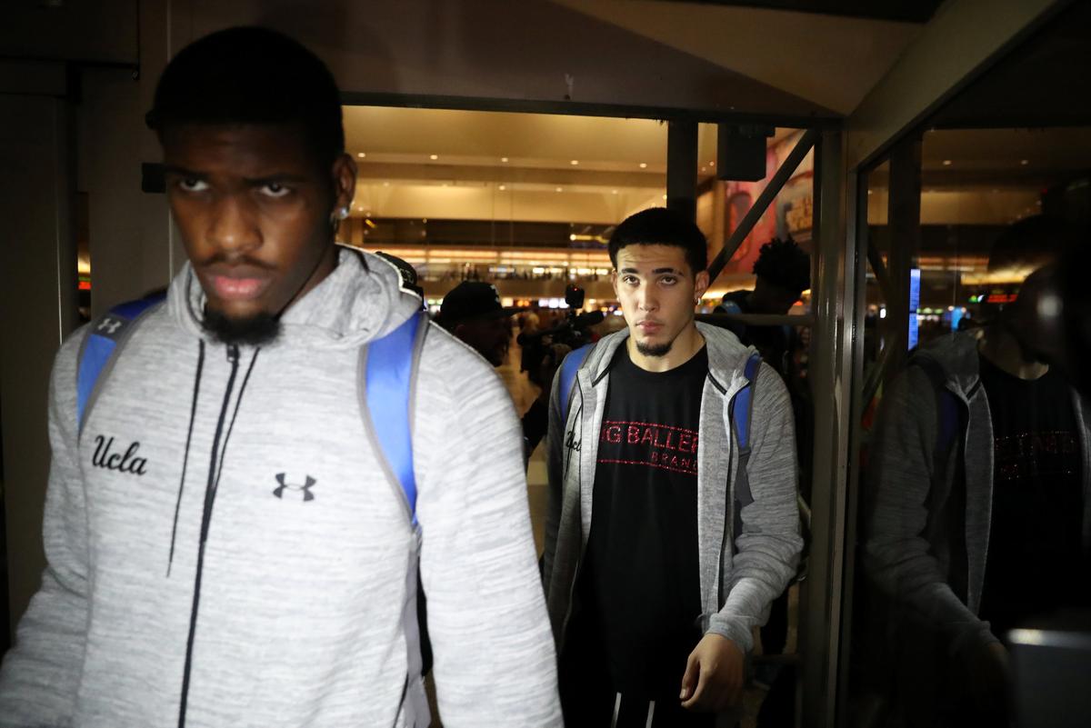 UCLA basketball players LiAngelo Ball (R) and Cody Riley arrive at LAX on Nov. 14, 2017. (REUTERS/Lucy Nicholson)