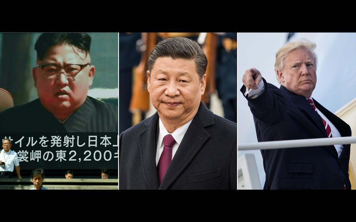 This combination of file pictures shows North Korean leader Kim Jong Un (L) being broadcast on a large video screen in Tokyo; Chinese leader Xi Jinping (C), and U.S. President Donald Trump (Toru Yamanaka, Fred Dufour, Brendan Smialowski/AFP/Getty Images)