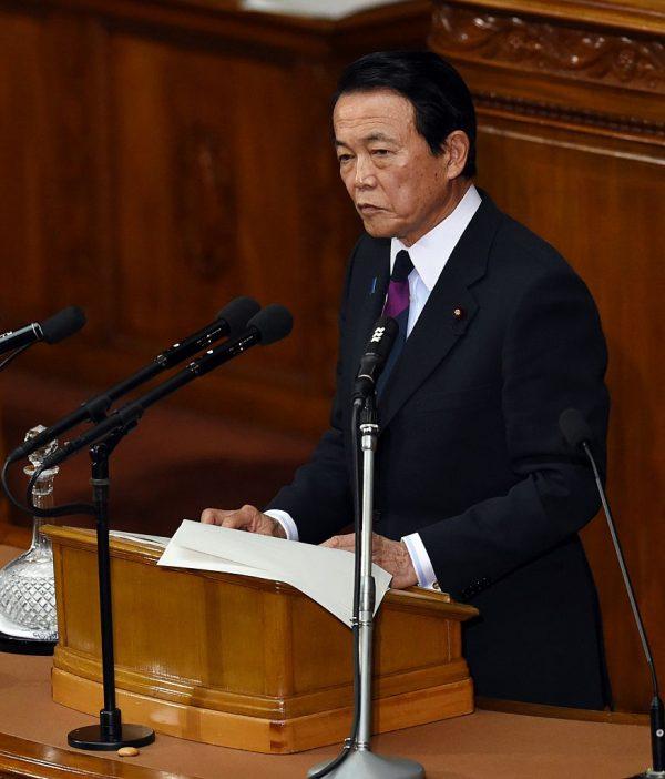Japanese Finance and Deputy Prime Minister Taro Aso delivers the financial policy speech at the lower house of the parliament in Tokyo on February 12, 2015. (Toshifumi Kitamura/AFP/Getty Images)