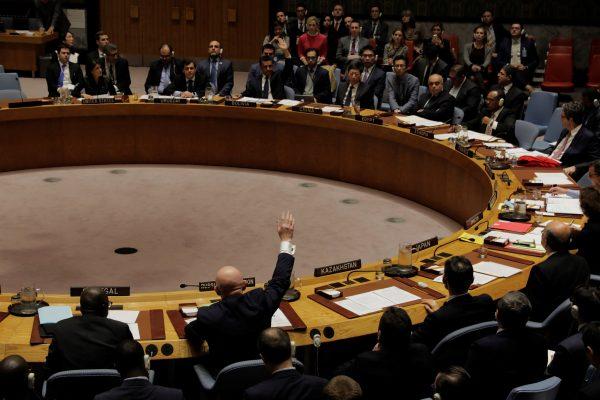 A representative of Russia votes in the United Nations (UN) Security Council against a bid to renew an international inquiry into chemical weapons attacks in Syria on Nov. 16, 2017. (REUTERS/Lucas Jackson)