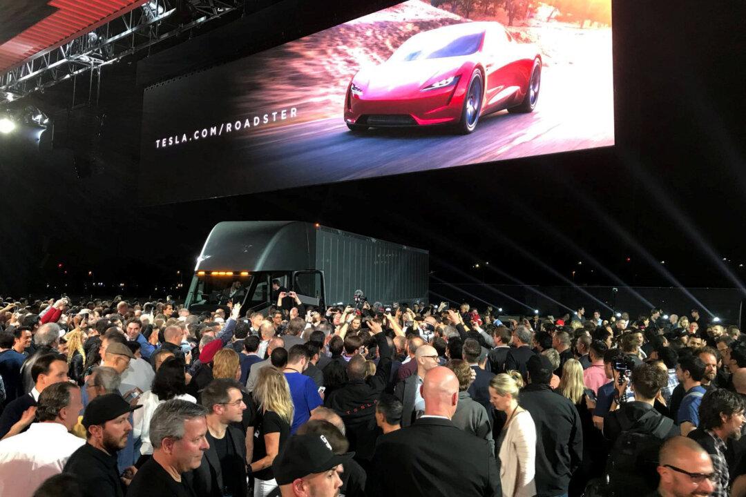 New $200,000 Tesla Roadster Speeds in Front of Electric Big-Rig Truck