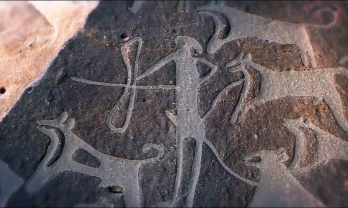 8,000-Year-Old Engraving Shows Dogs Were Helping Humans Hunt