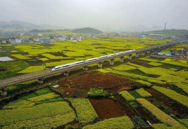 A high-speed train traveling on the railway in Anshun City, in southwest China's Guizhou Province on March 16, 2017. (STR/AFP/Getty Images)
