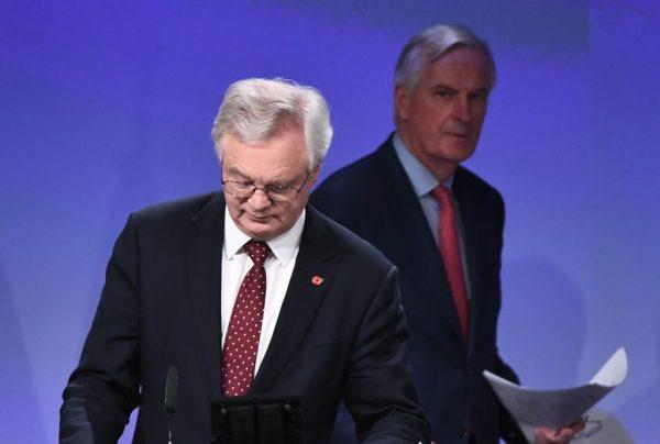 Britain's chief Brexit negotiator David Davis (L) and EU's chief Brexit negotiator Michel Barnier arrive to address the media following a sixth round of Brexit talks at the European Union Commission building in Brussels on November 10, 2017. (Emmanuel Dunand/AFP/Getty Images)