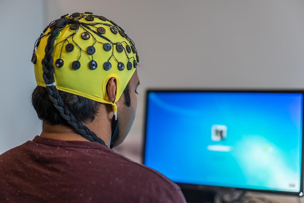 A file photo of a man wearing an Electroencephalography (EEG) cap. (Ulrich W.)