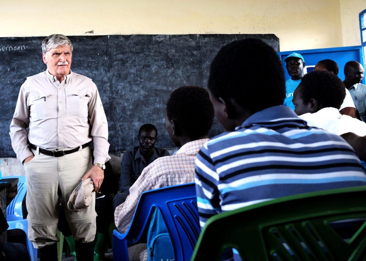 Retired lieutenant-general Romeo Dallaire, founder of the Child Soldiers Initiative, addresses former child soldiers in Pibor, South Sudan, in 2015. (Josh Boyter)
