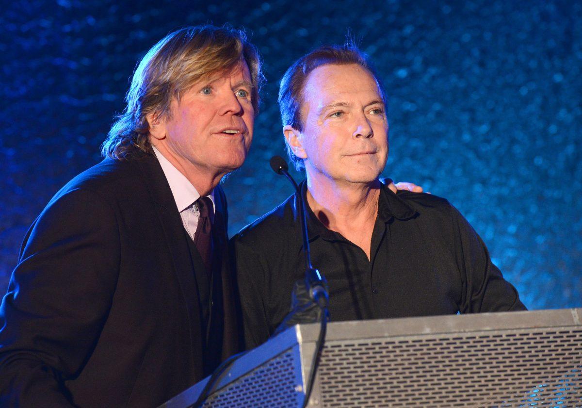 Peter Noone and David Cassidy speak on stage during the IEBA and CMA Present Hall of Fame and SRO Awards Dinner at IEBA Conference Day 3 at the Sheraton Nashville Downtown on October 9, 2012 in Nashville, Tennessee. (Photo by Rick Diamond/Getty Images for IEBA)