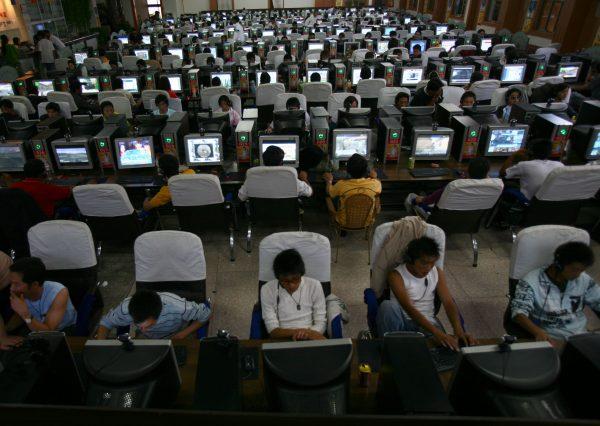 People at an internet cafe in Lhasa, Tibet Autonomous Region, China, on August 30, 2006. (China Photos/Getty Images)