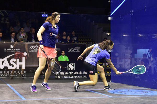 Raneem El Welily on strike against world No 1 Nour El Sherbini in the final of the Hong Kong Squash Open in Hong Kong on Nov 19, 2017. (Bill Cox/Epoch Times)