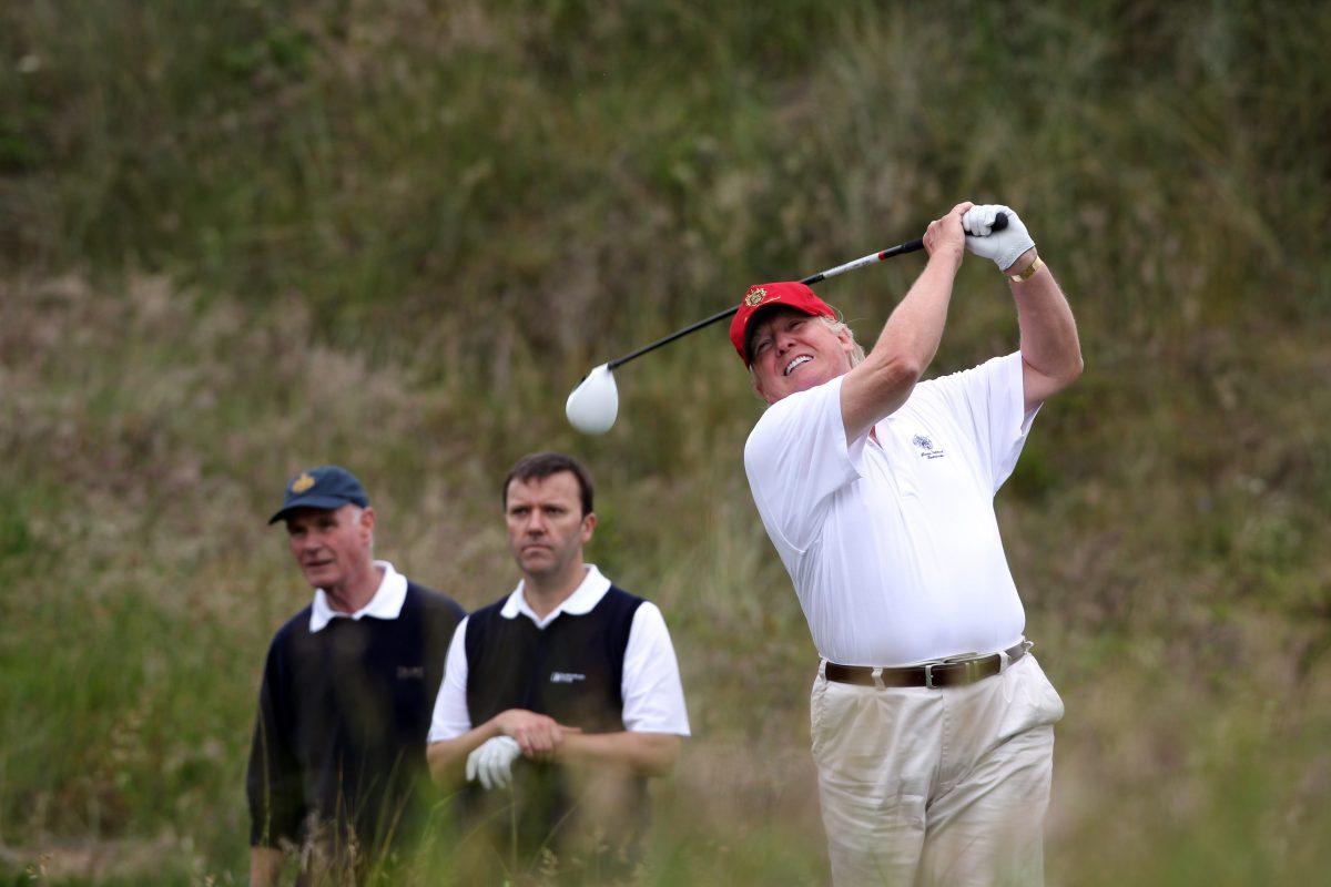 Donald Trump tees off from the third after the opening of The Trump International Golf Links Course in Balmedie, Scotland, in 2012. (Ian MacNicol/Getty Images)