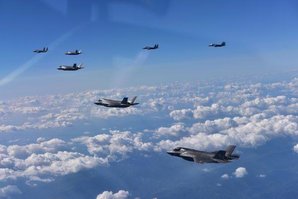 South Korea's F-15K fighter jets and U.S. marine's F-35B fly over the Korean Peninsula during a training on August 31, 2017 in Gangwon-do, South Korea. (Handout/South Korean Defense Ministry via Getty Images)