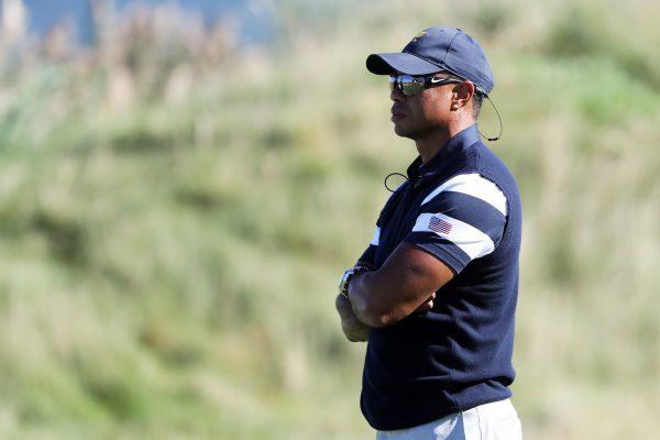 Captain's assistant Tiger Woods of the U.S. Team looks on during foursome matches of the Presidents Cup at Liberty National Golf Club on Sept. 28, 2017 in Jersey City, New Jersey. (Sam Greenwood/Getty Images)