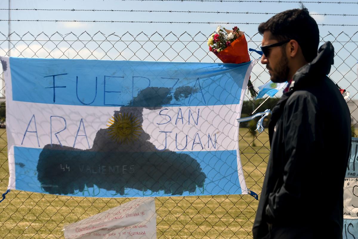 A relative of a missing Argentine submarine crew member is pictured outside Argentina's Navy base in Mar del Plata, Argentina, on Nov. 24. (EITAN ABRAMOVICH/AFP/Getty Images)