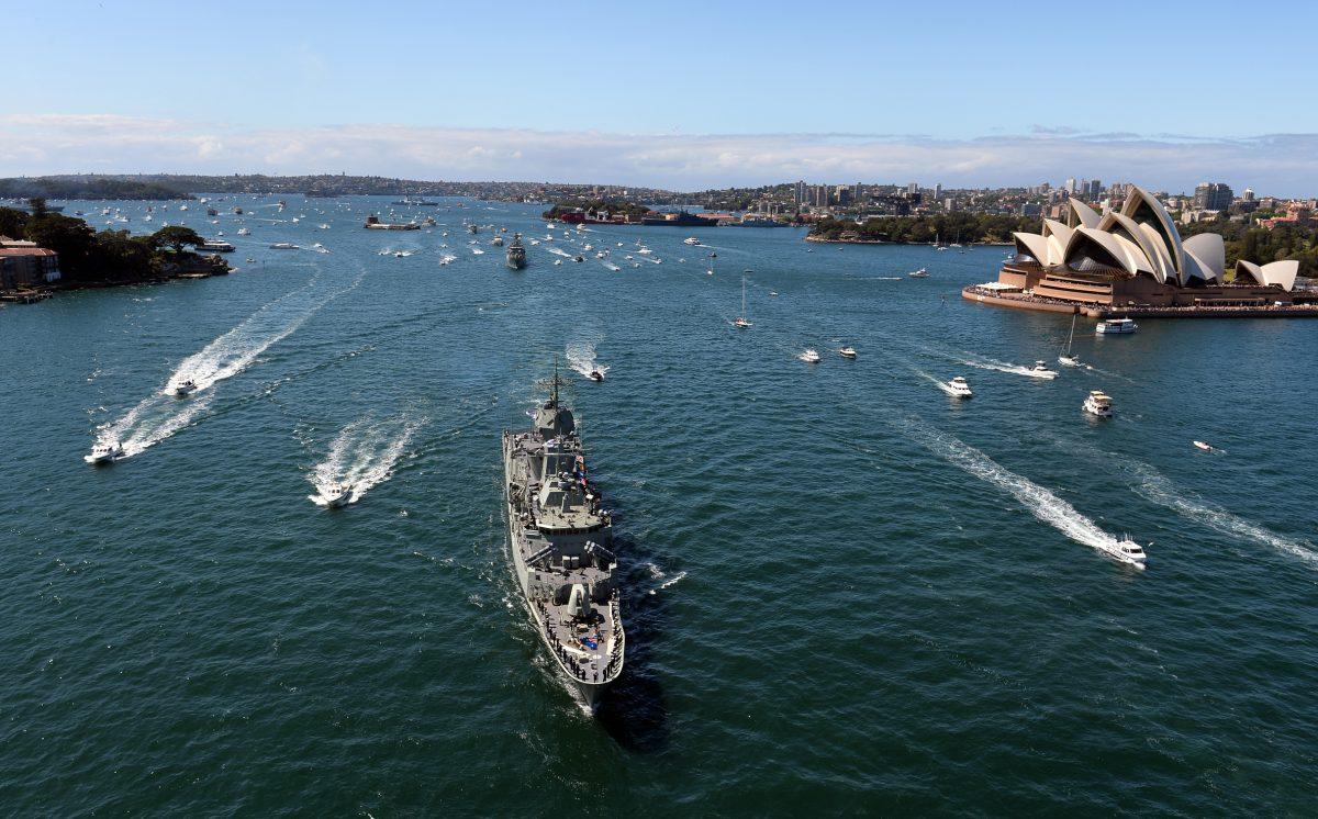 Royal Australian Navy warship HMAS Paramatta sails in front of the iconic Sydney Opera House on Oct. 4, 2013. (Saeed Khan/AFP/Getty Images)